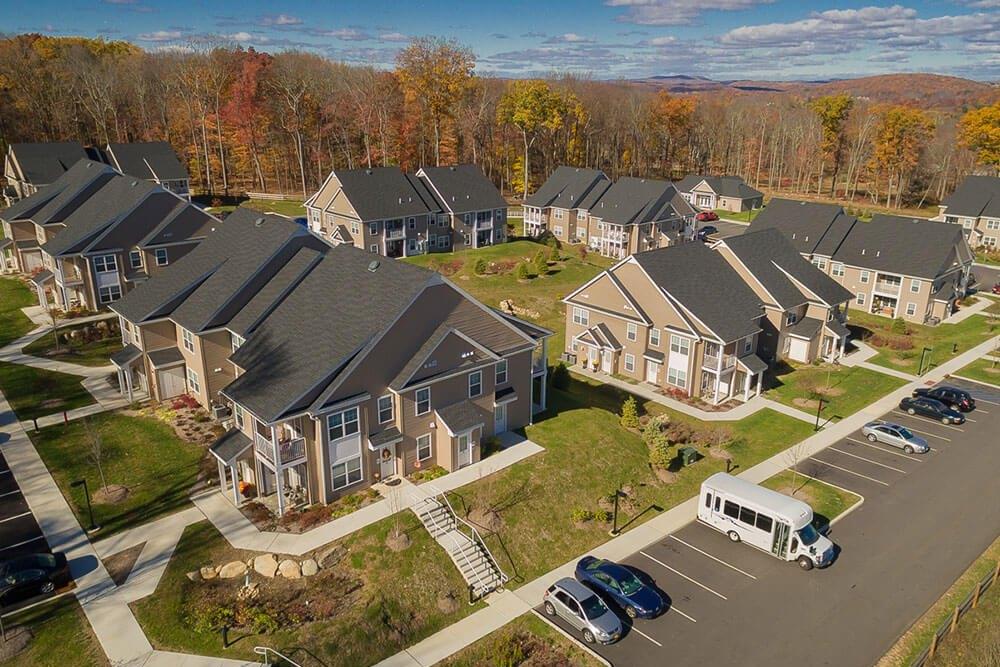 Aerial view across the Bridleside apartment buildings in autumn