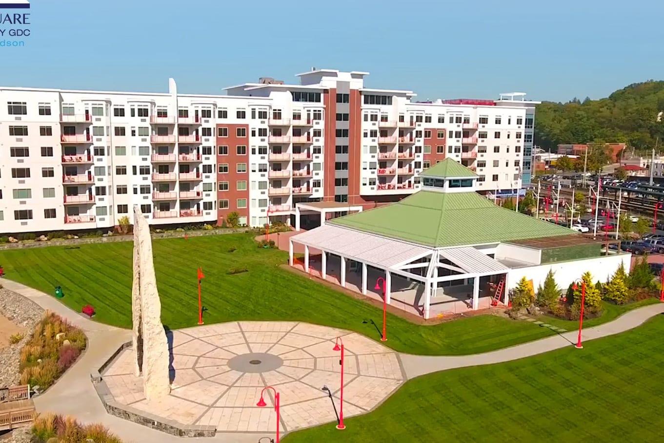 Aerial view of Harbor Square apartments and waterfront park
