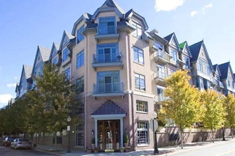 Corner entrance of the Marbury Corners condominium building
