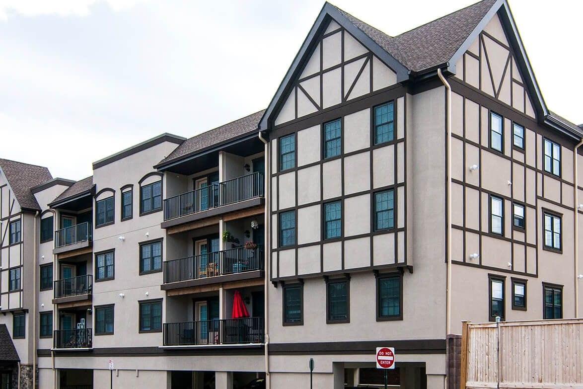 Tudor-style facade of the Pinebrook condominiums